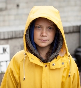 Greta Thunberg in her yellow raincoat